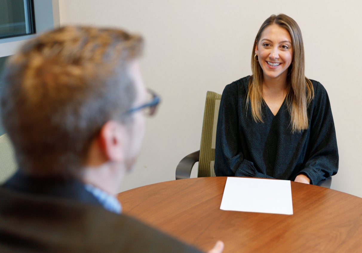 Job applicant getting interviewed in a conference room